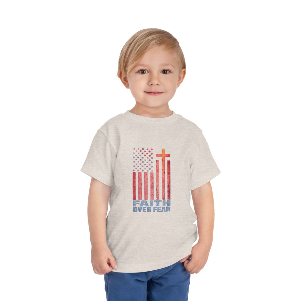 Toddler Tee — "Faith Over Fear" American Flag Cross Graphic