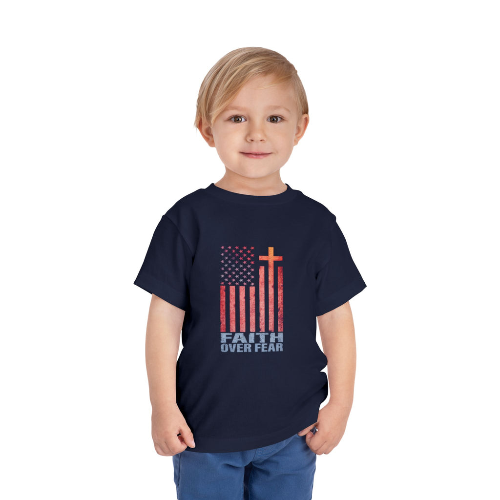Toddler Tee — "Faith Over Fear" American Flag Cross Graphic