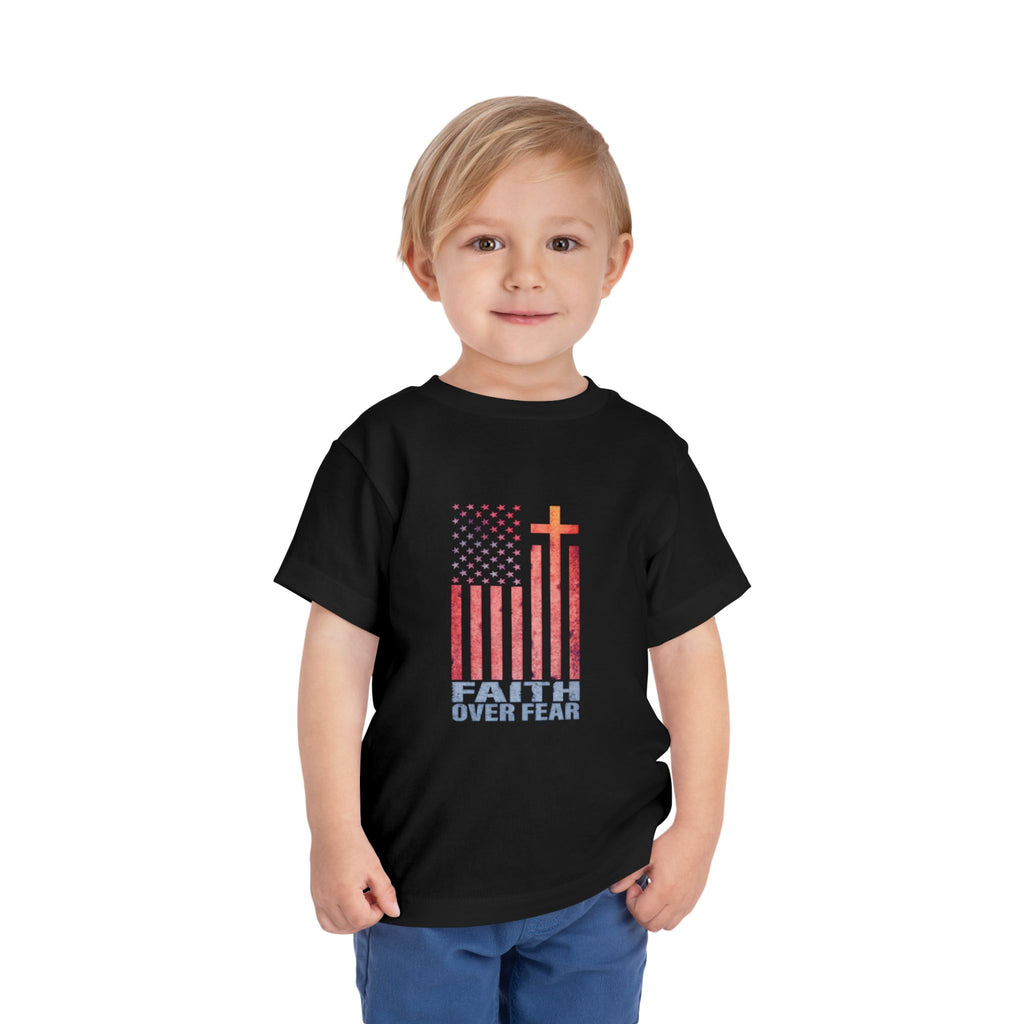 Toddler Tee — "Faith Over Fear" American Flag Cross Graphic